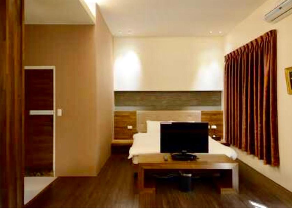 TV a/nebo společenská místnost v ubytování Pretty B&B