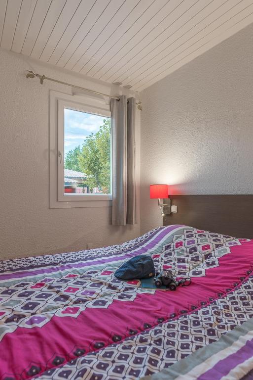 Postel nebo postele na pokoji v ubytování L'Hôtel du Méditerranée