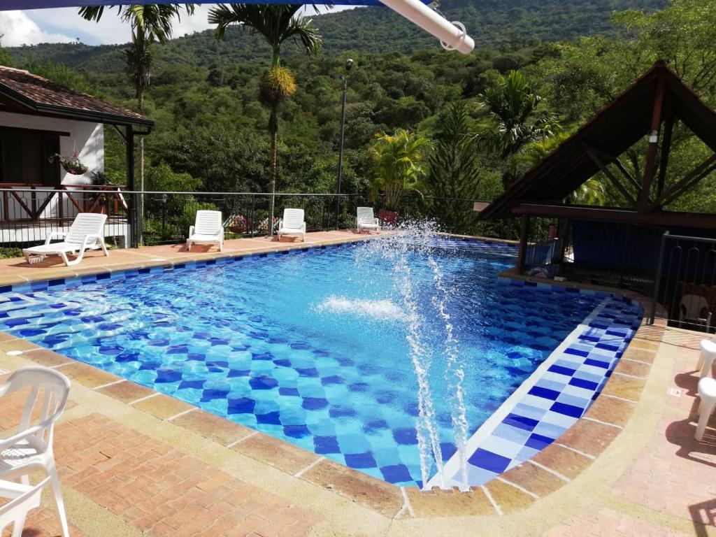 Bazén v ubytování Hotel Verano Resort San Gil nebo v jeho okolí