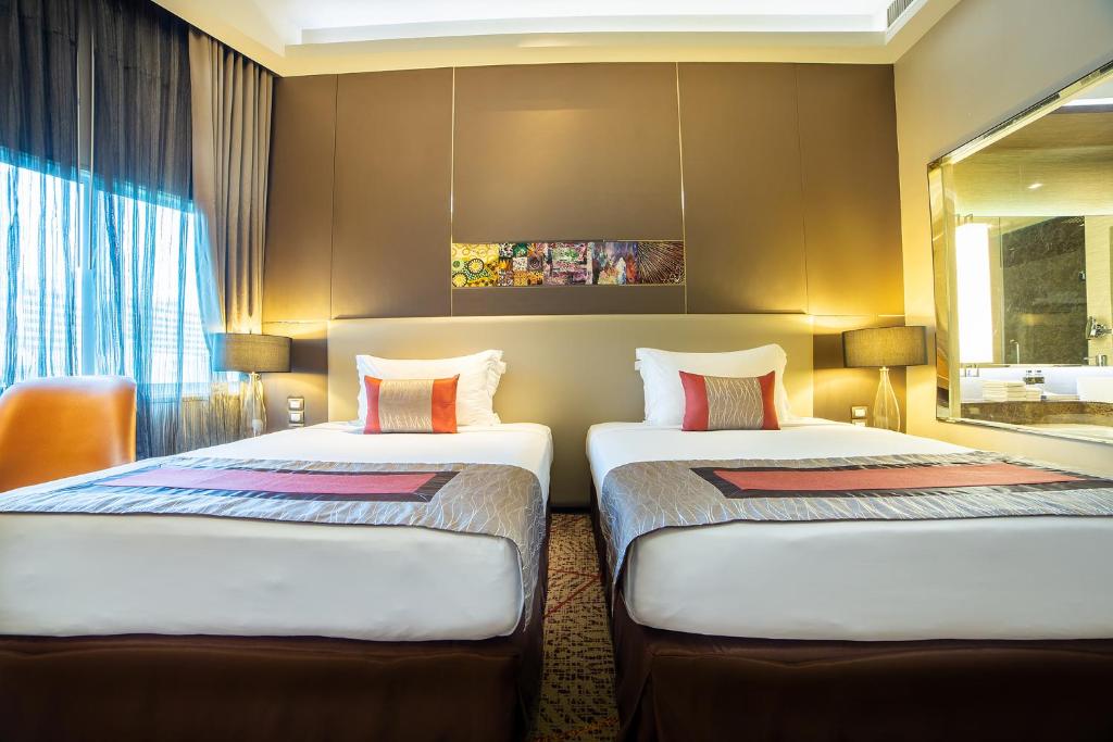 Postel nebo postele na pokoji v ubytování Graceland Bangkok by Grace Hotel - SHA Extra Plus