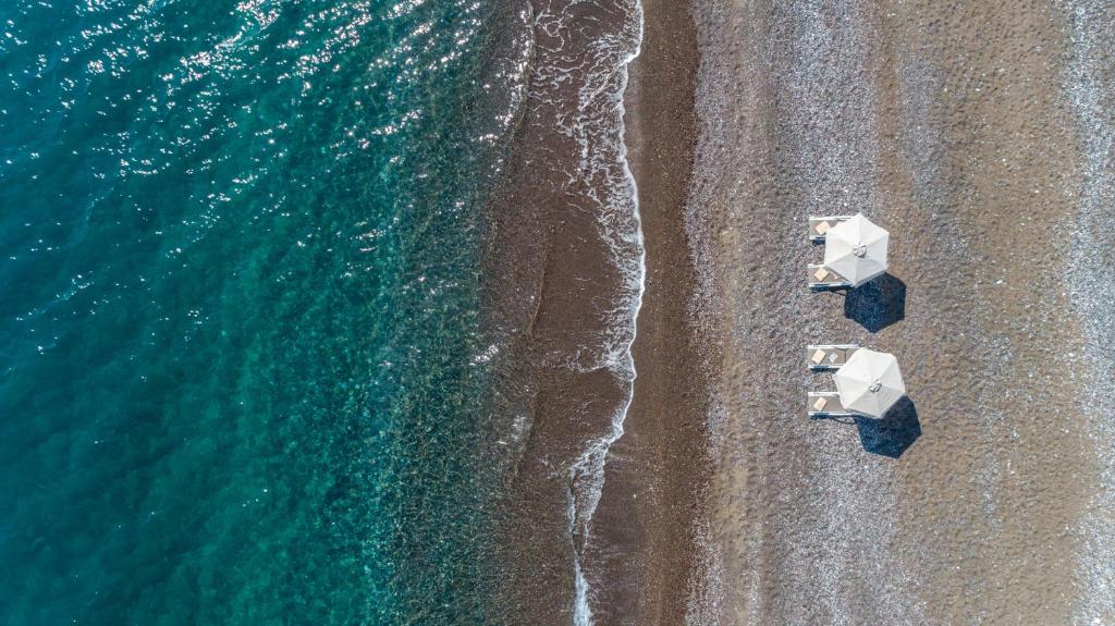 an overhead view of the beach and the ocean at Great Sand Villa in Gennadi