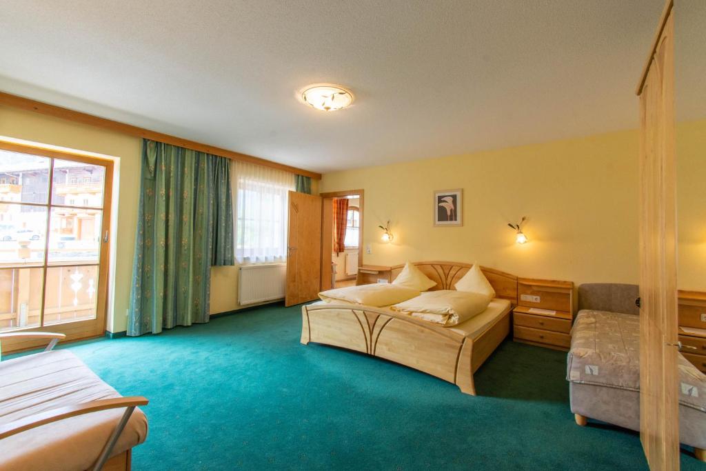 Letto o letti in una camera di Pension&Appartements Marxenhof