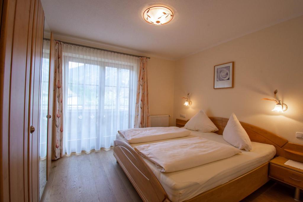 Letto o letti in una camera di Pension&Appartements Marxenhof