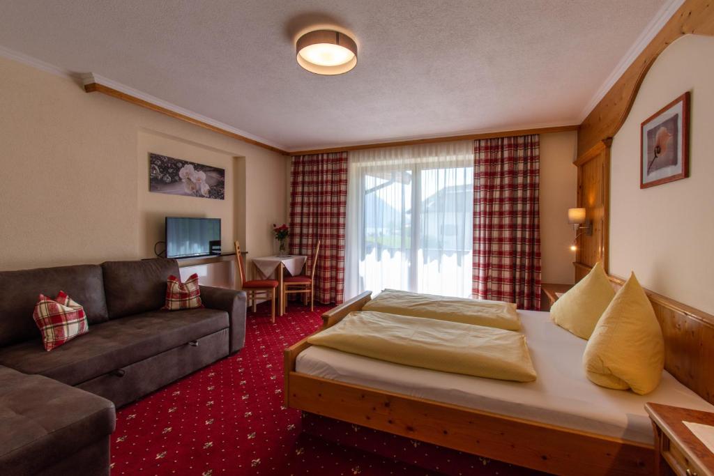 Letto o letti in una camera di Pension&Appartements Marxenhof