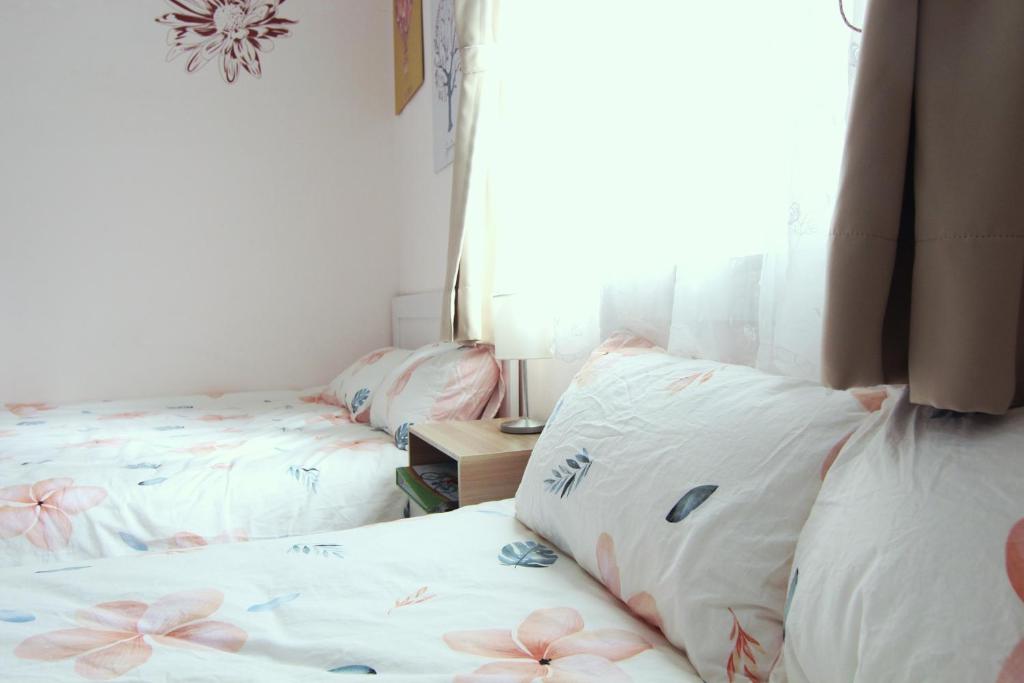 Tainan Travel Inn - ChengGong Univ. - Chambre Quadruple Avec Salle De Bain Partagée