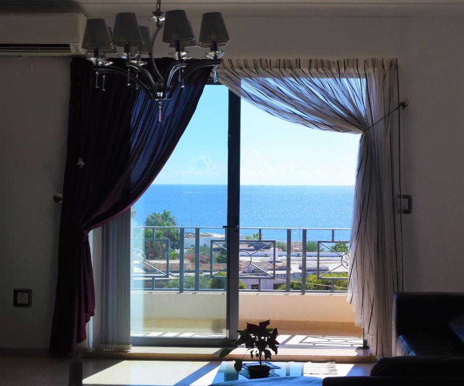 a large window with a view of the ocean at Ullswater No. 9 in Marsaskala