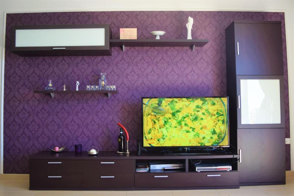 Televiisor ja/või meelelahutuskeskus majutusasutuses Ullswater No. 9
