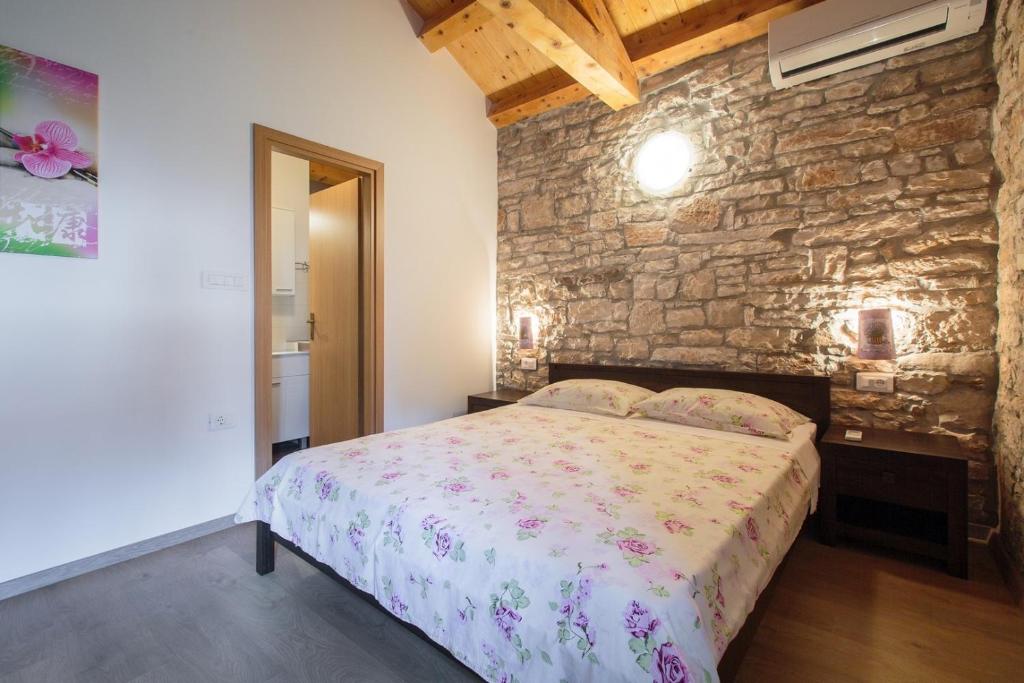 Łóżko lub łóżka w pokoju w obiekcie Didova Villa in the Heart of Istria