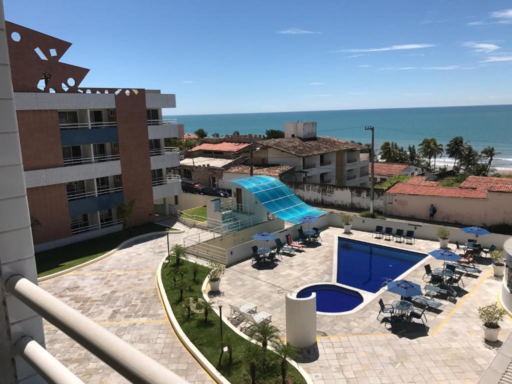 a view of a resort with a swimming pool at Terrazzo Ponta Negra Flat in Natal