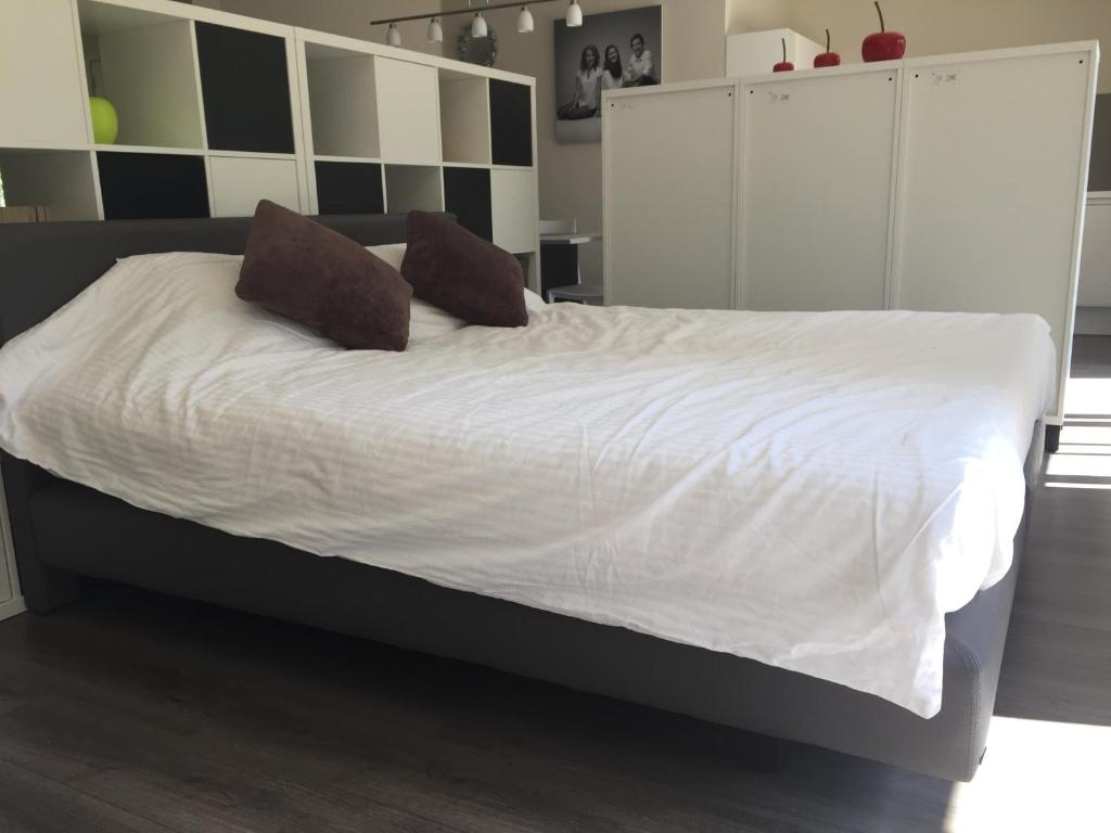 Postel nebo postele na pokoji v ubytování Villa Kokeliko