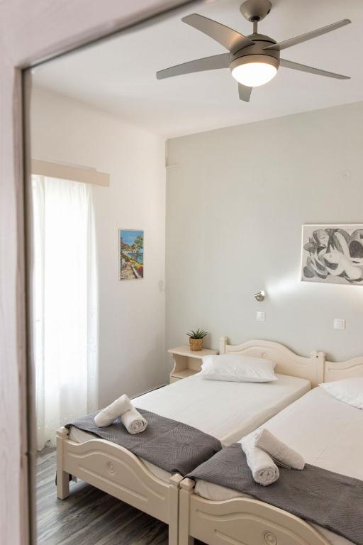 Postel nebo postele na pokoji v ubytování Apartments Tarsa