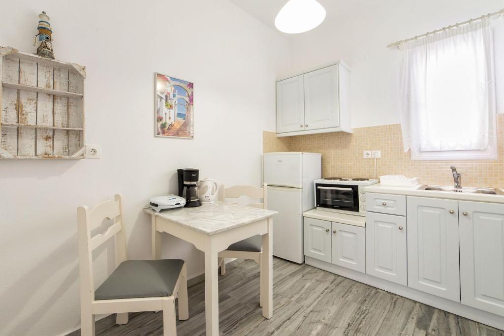 Kuchyň nebo kuchyňský kout v ubytování Apartments Tarsa