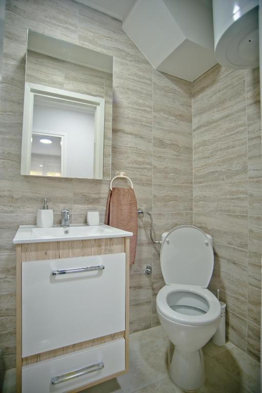 Koupelna v ubytování Park Apartman