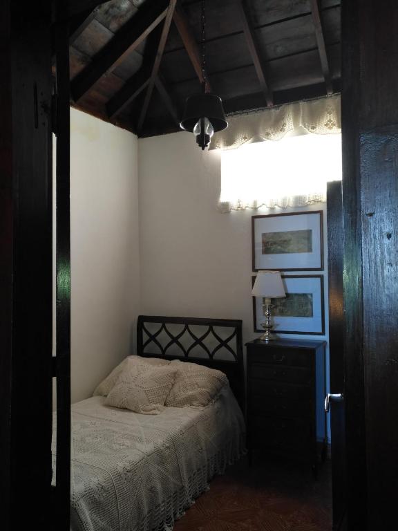 A bed or beds in a room at Casa Eremia