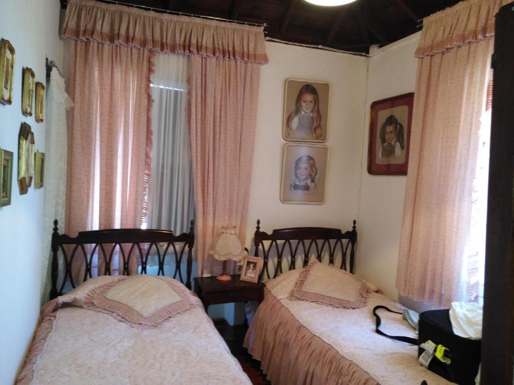 A bed or beds in a room at Casa Eremia