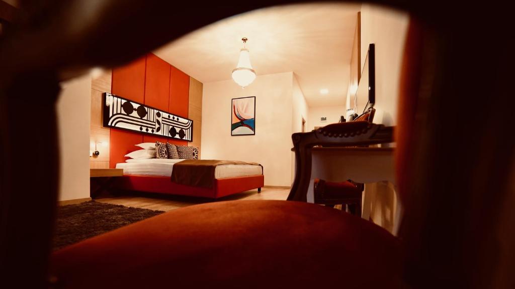 Postel nebo postele na pokoji v ubytování Astoria Hotel & SPA