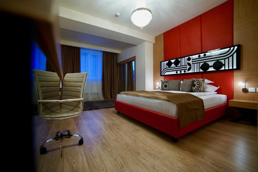Postel nebo postele na pokoji v ubytování Astoria Hotel & SPA