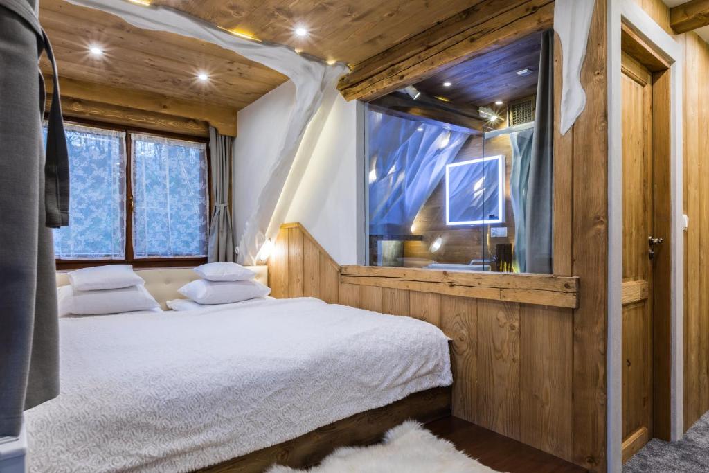Posteľ alebo postele v izbe v ubytovaní Apartamenty Szymaszkowa