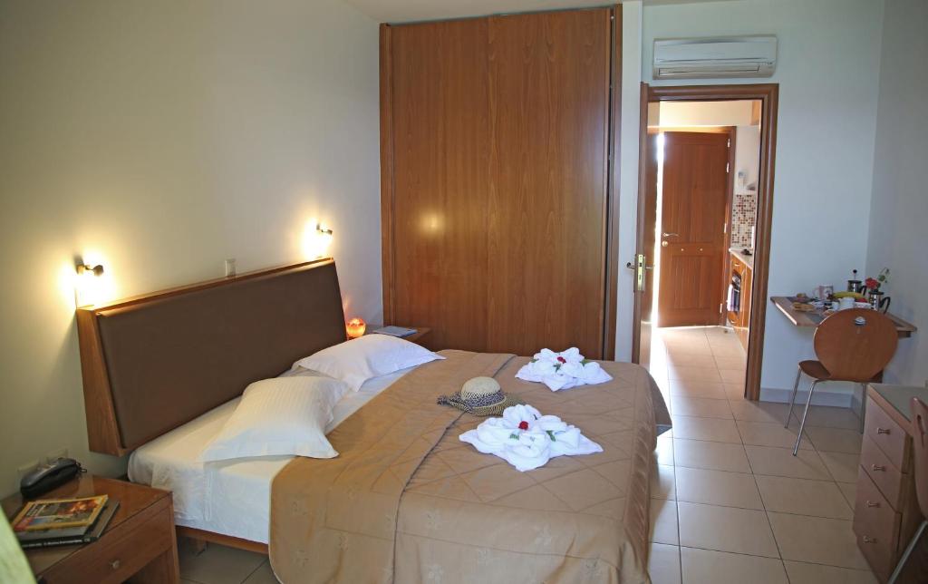 Postel nebo postele na pokoji v ubytování Sitia Bay