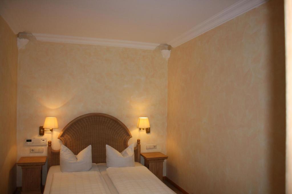 Postel nebo postele na pokoji v ubytování Privathotel Brügges Loui