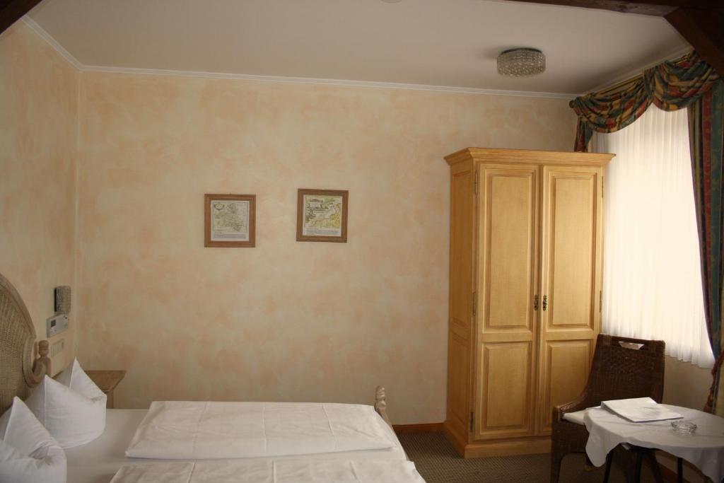 Postel nebo postele na pokoji v ubytování Privathotel Brügges Loui