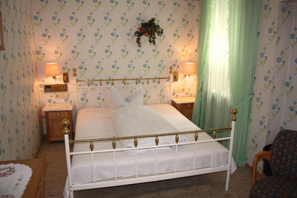 Postel nebo postele na pokoji v ubytování Privathotel Brügges Loui