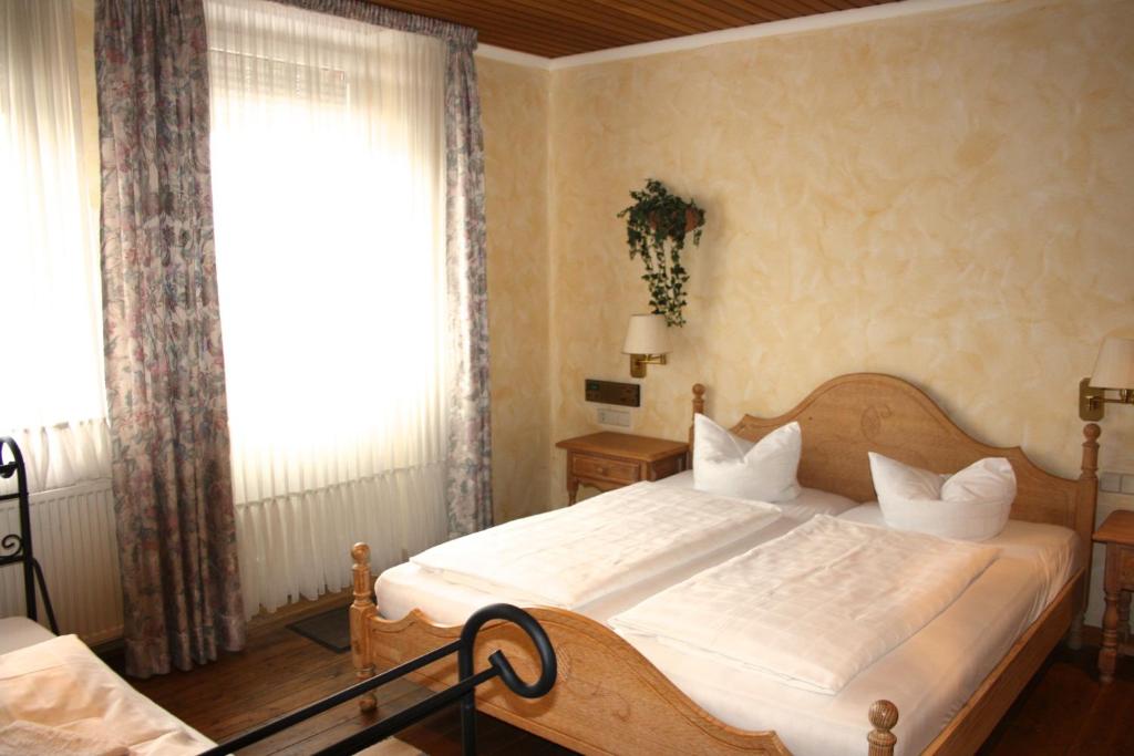 Postel nebo postele na pokoji v ubytování Privathotel Brügges Loui