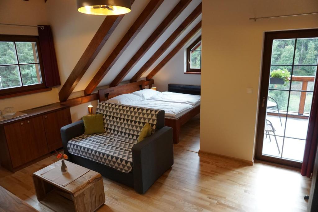 Postel nebo postele na pokoji v ubytování Jezírko lesní restaurant & penzion