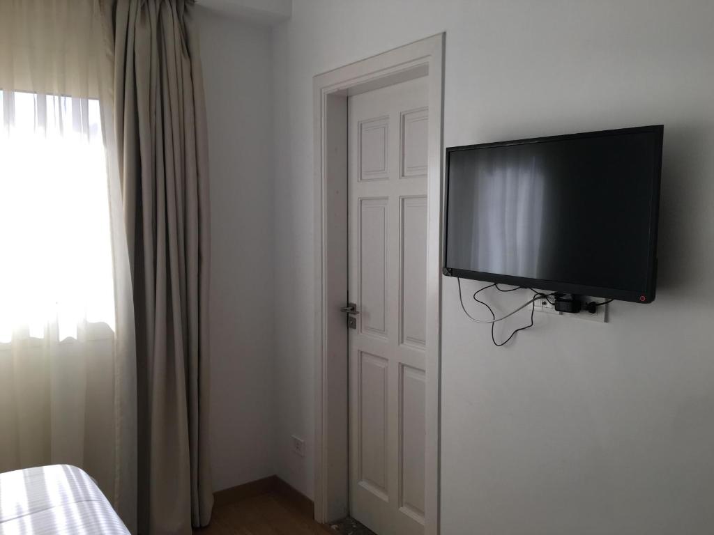 TV a/nebo společenská místnost v ubytování E-Just Hotel Borg El Arab