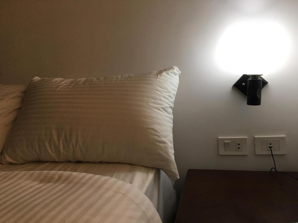 Postel nebo postele na pokoji v ubytování E-Just Hotel Borg El Arab