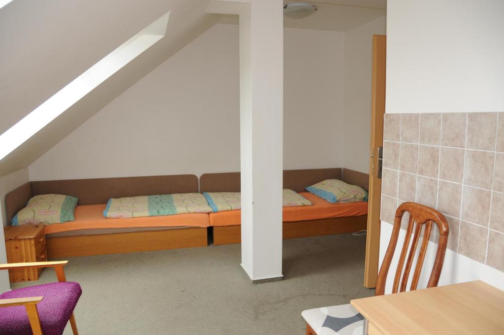 Postel nebo postele na pokoji v ubytování Penzion Pupendo