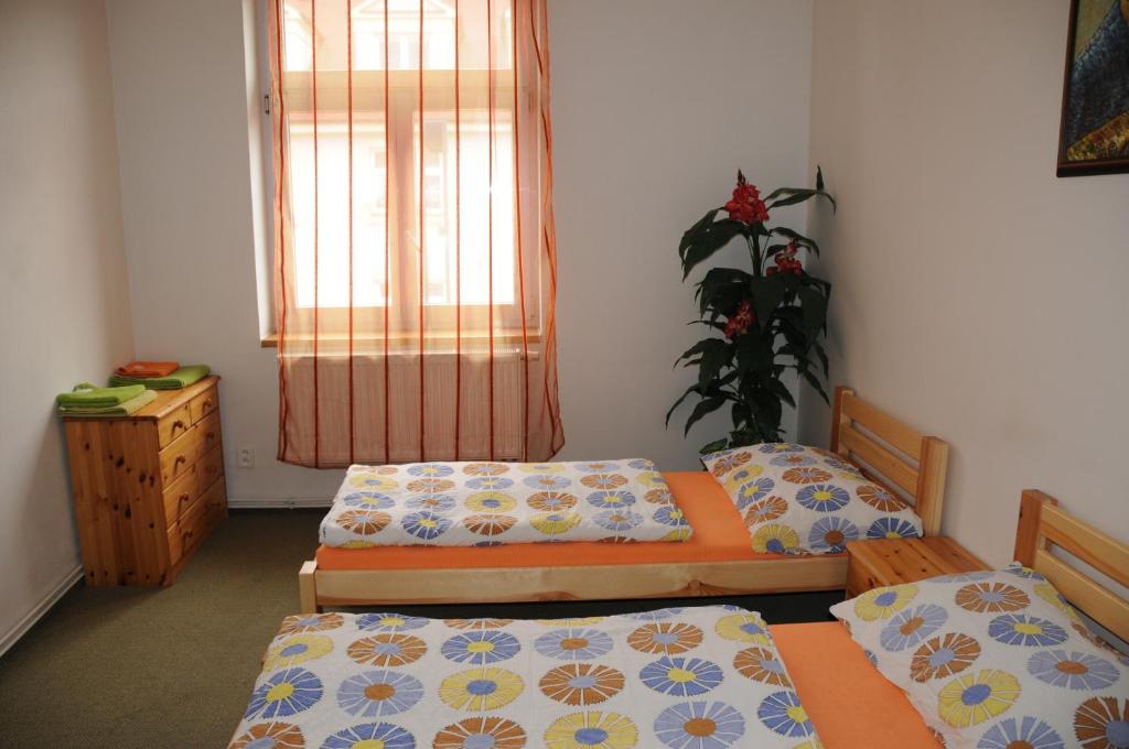 Postel nebo postele na pokoji v ubytování Penzion Pupendo