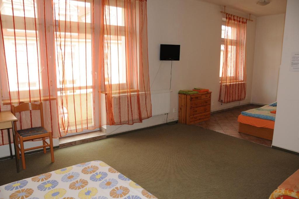 TV a/nebo společenská místnost v ubytování Penzion Pupendo