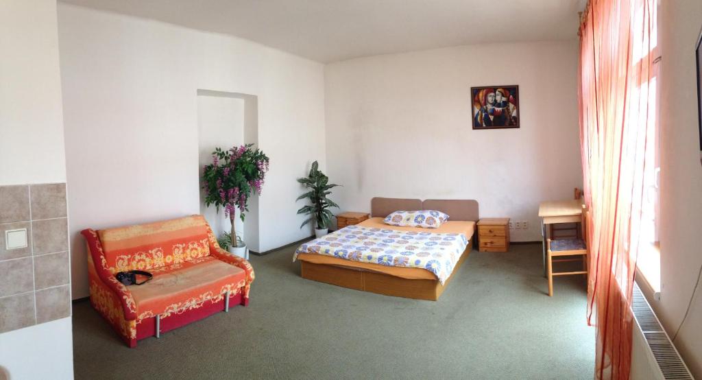 Cama o camas de una habitación en Penzion Pupendo