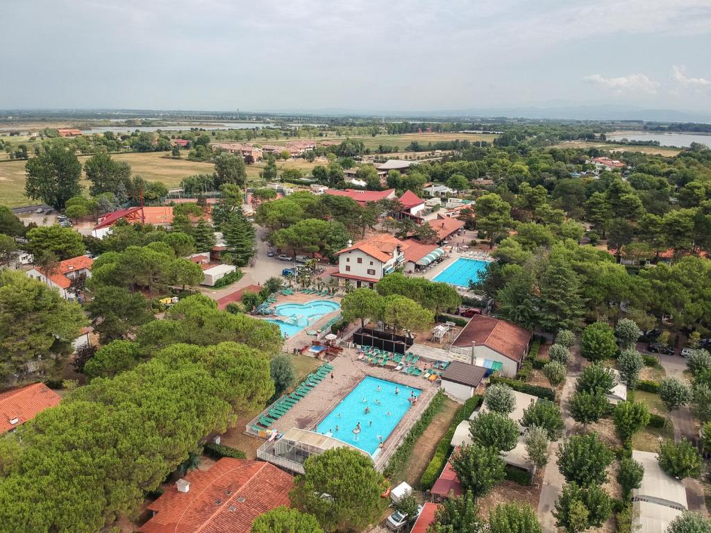 an aerial view of a resort with two pools at Residence Punta Spin in Grado