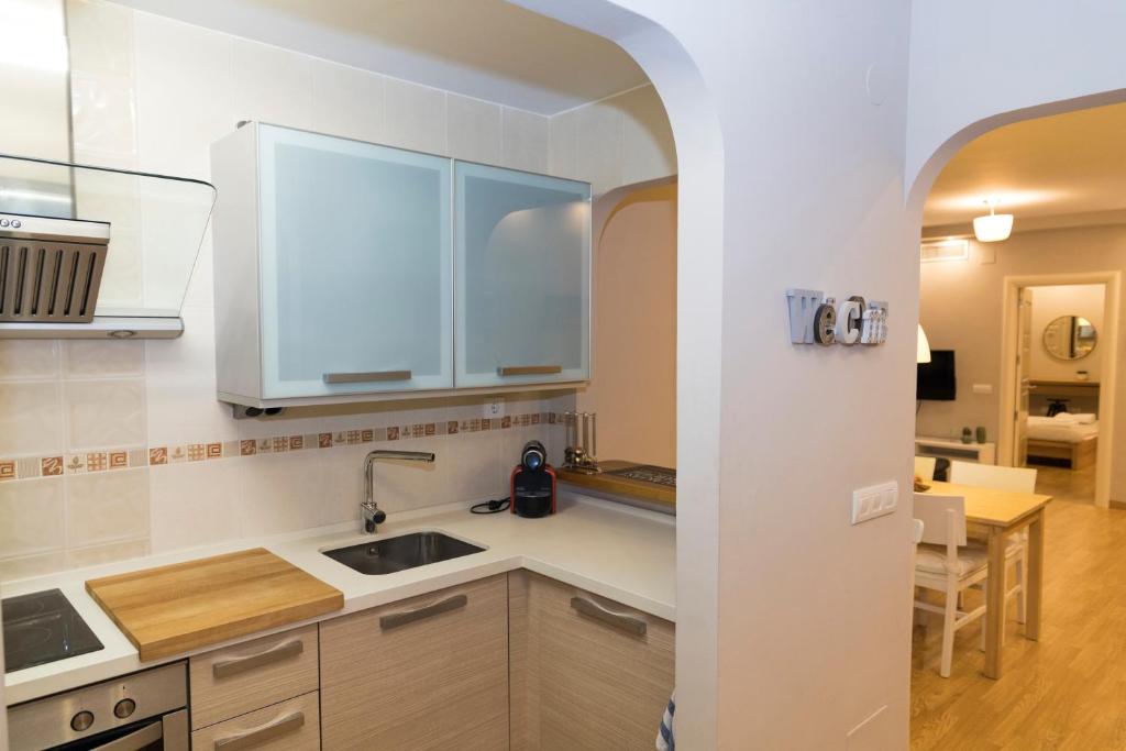 Kuchyňa alebo kuchynka v ubytovaní Apartamento Melina Arlu - Centro Historico