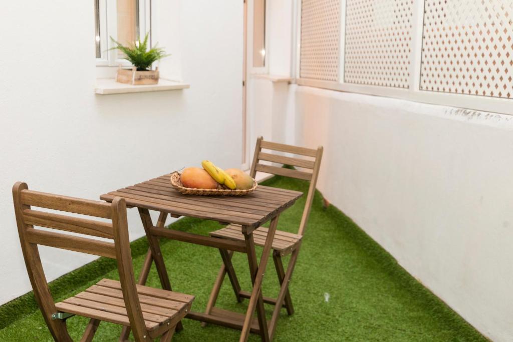 Posedenie v ubytovaní Apartamento Melina Arlu - Centro Historico