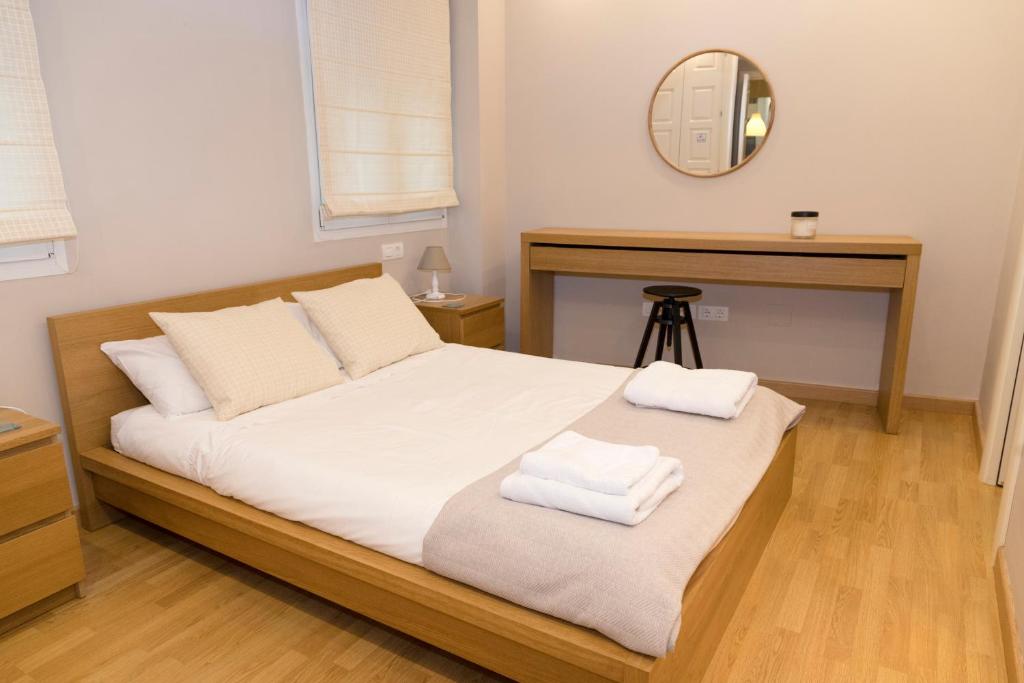Posteľ alebo postele v izbe v ubytovaní Apartamento Melina Arlu - Centro Historico