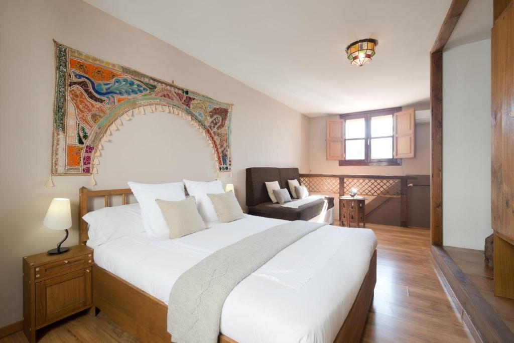 Postel nebo postele na pokoji v ubytování Casa Bombo