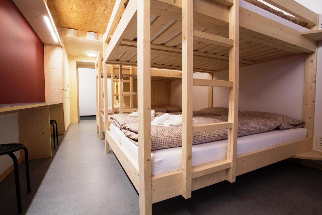 Postel nebo postele na pokoji v ubytování Sport- und Ferienhaus Don Bosco