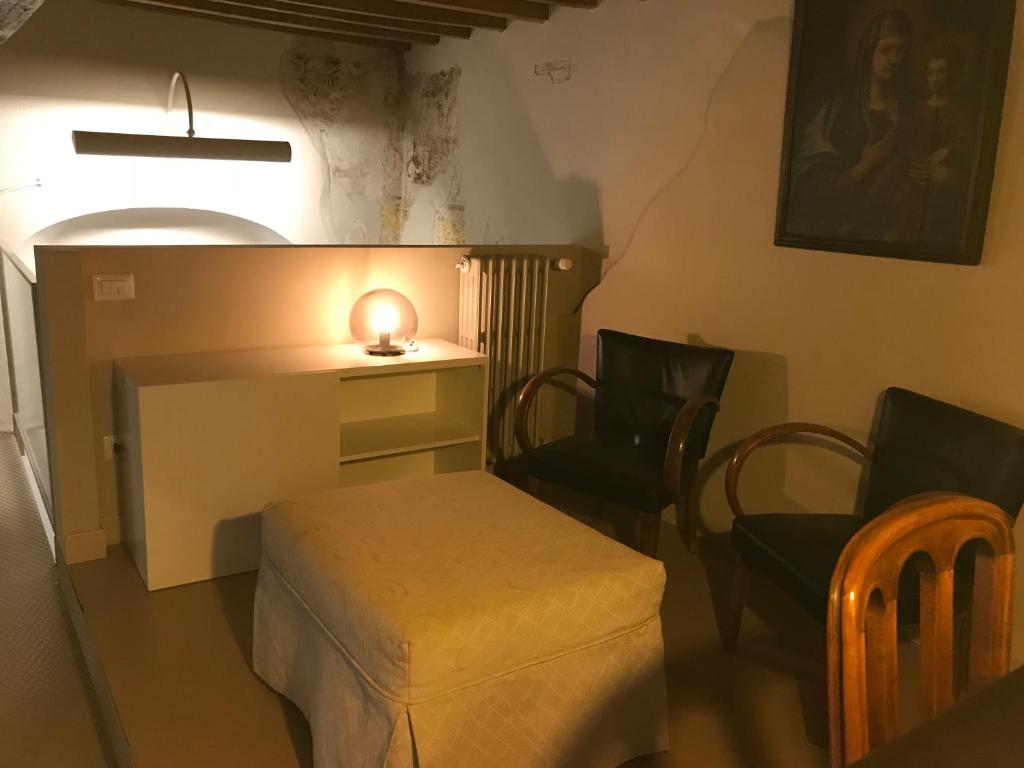 Postel nebo postele na pokoji v ubytování Luigi in Palazzo Bianchi
