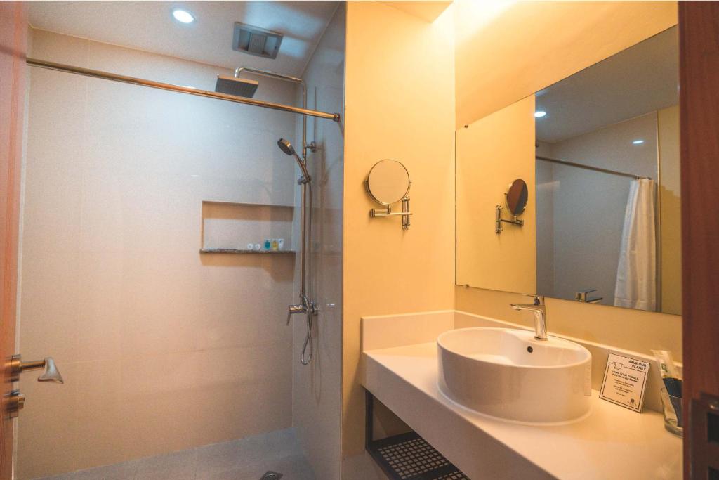 Koupelna v ubytování Henia Hotel