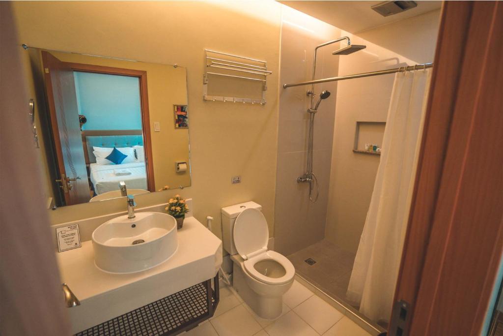 Koupelna v ubytování Henia Hotel