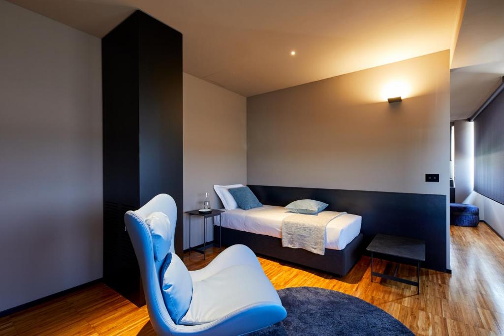 Postel nebo postele na pokoji v ubytování Delparco Hotel