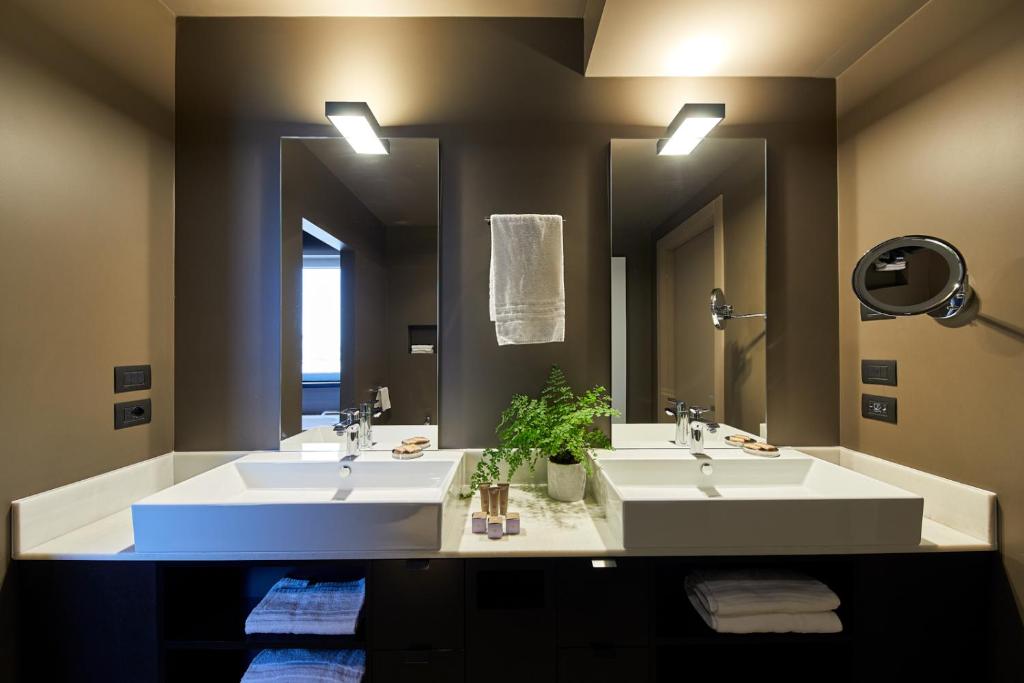 Koupelna v ubytování Delparco Hotel