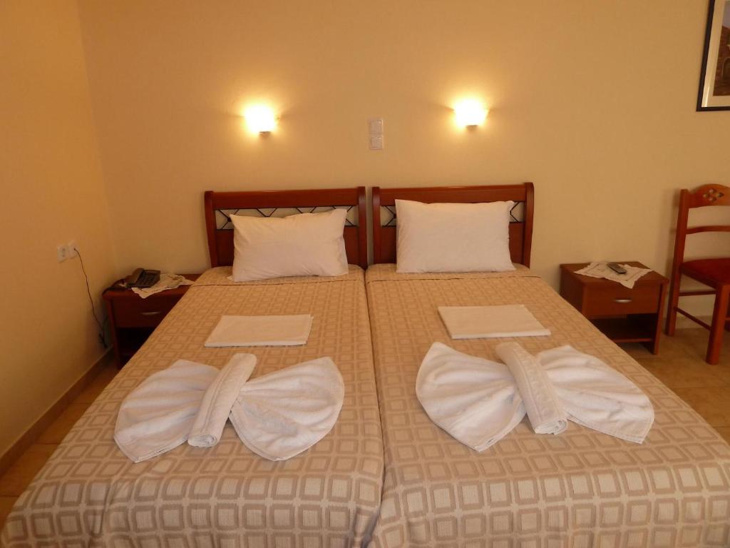 Postel nebo postele na pokoji v ubytování Elafonisos Diamond Resort