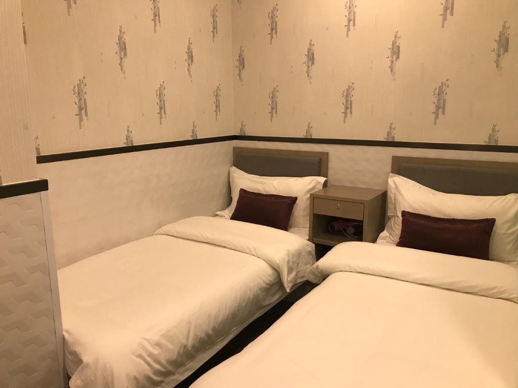 Katil atau katil-katil dalam bilik di Vve Vve Hotel
