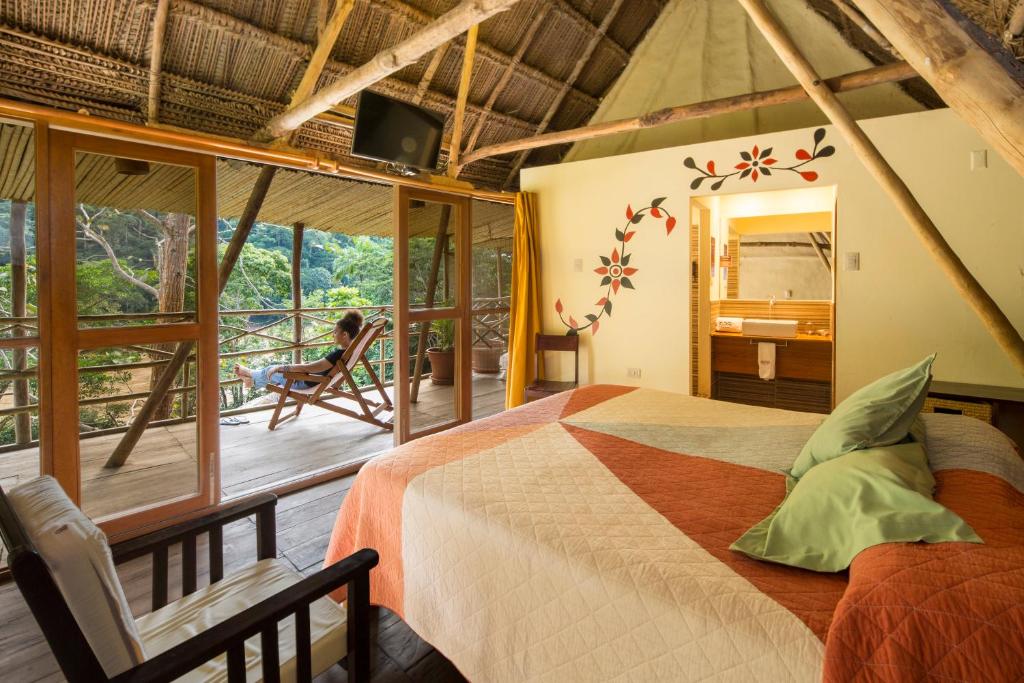 Postel nebo postele na pokoji v ubytování Pumarinri Amazon Lodge