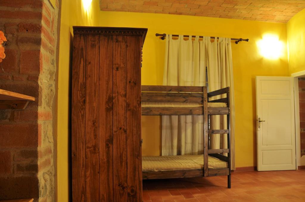Posteľ alebo postele v izbe v ubytovaní Podere Campi al Mare