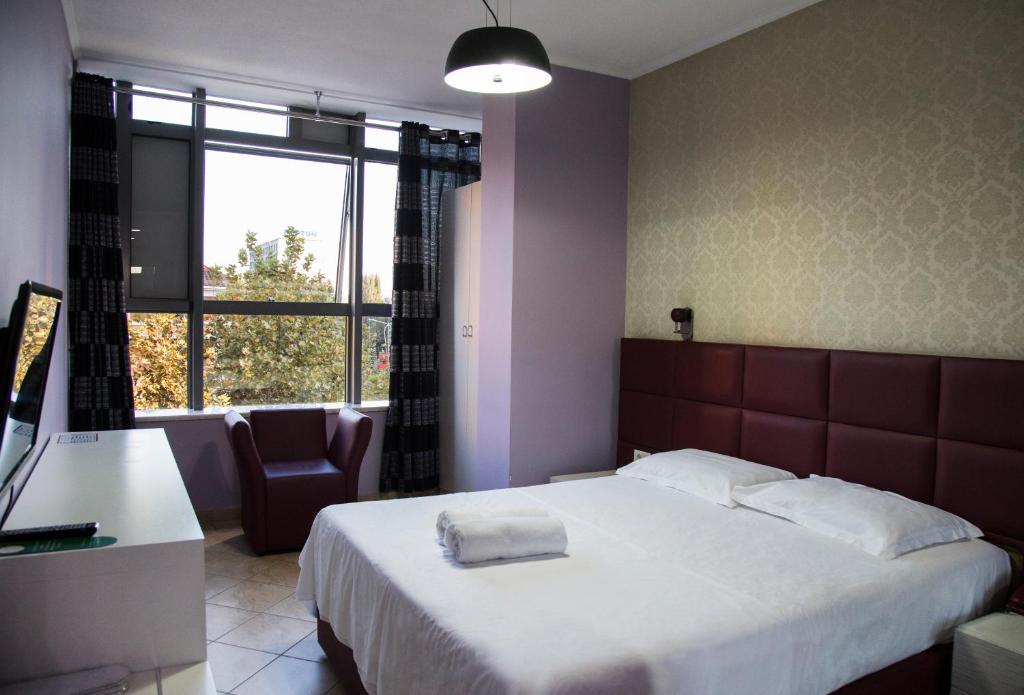 Postel nebo postele na pokoji v ubytování Hotel Relax